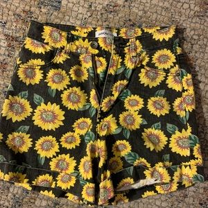Sunflower print denim shorts